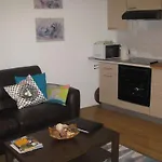 Au Pied De La
